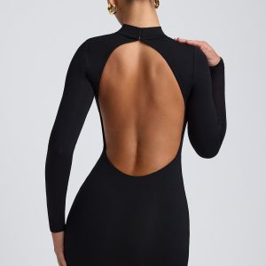 Modal Open-Back Long-Sleeve Mini Dress in Black - Image 1